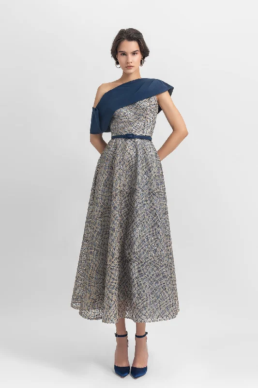 A-line beaded dress with an asymmetrical draped neckline, paired with a detachable belt