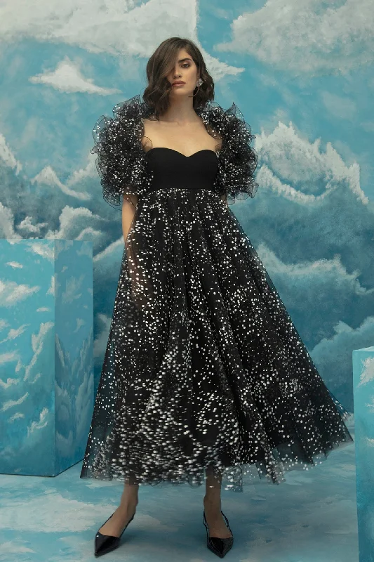 Point d'esprit tulle dress featuring ruffled bolero